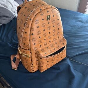 MCM Tan Backpack with Gold Accents